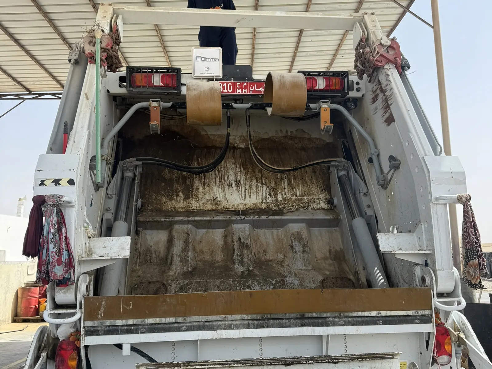 RFID antenna on the bin lifter of a refuse compactor